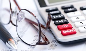 Tax Calculator Pen And Glasses